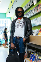 CGSIB shirt on Mister Wallace in Rattleback record store. Photo by www.ashabio.com